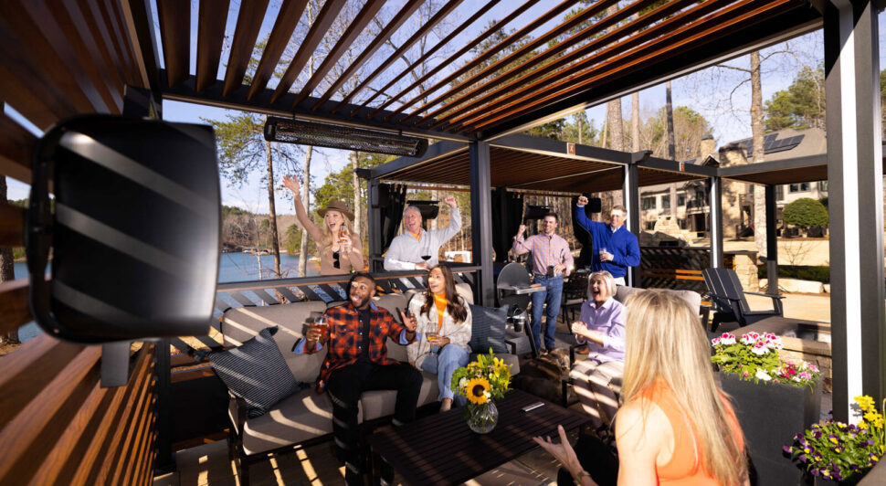 Family enjoying movie at home outdoor Cabana X design