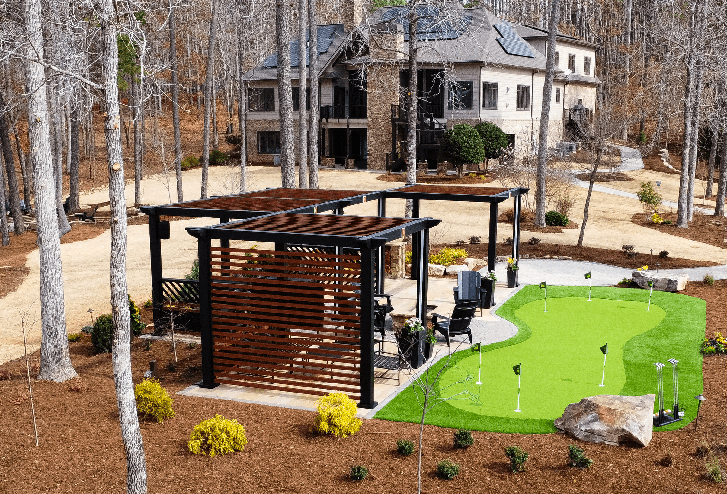 four black brown Pergola design beside mini golf grass