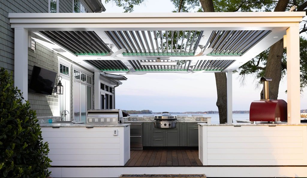 StruXure Pergola X over a backyard kitchen area. 
