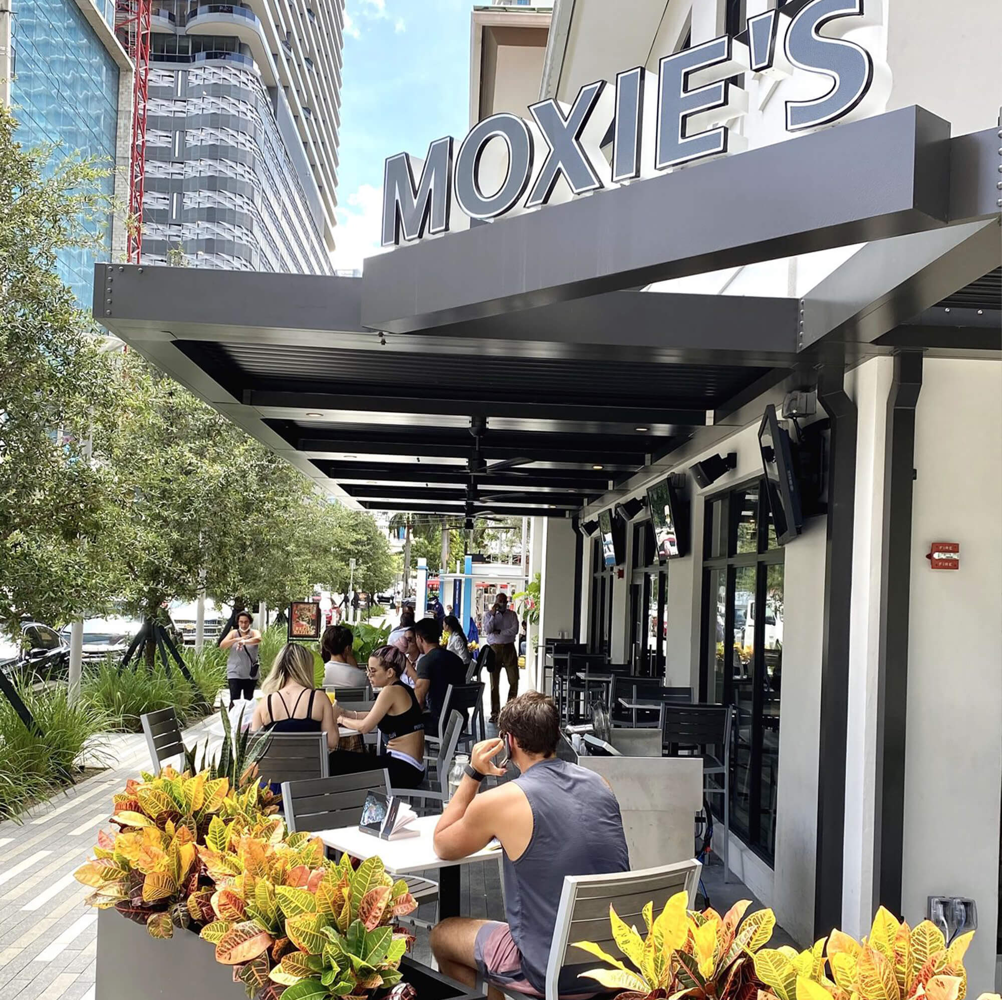 Moxies restaurant outdoor view with customers