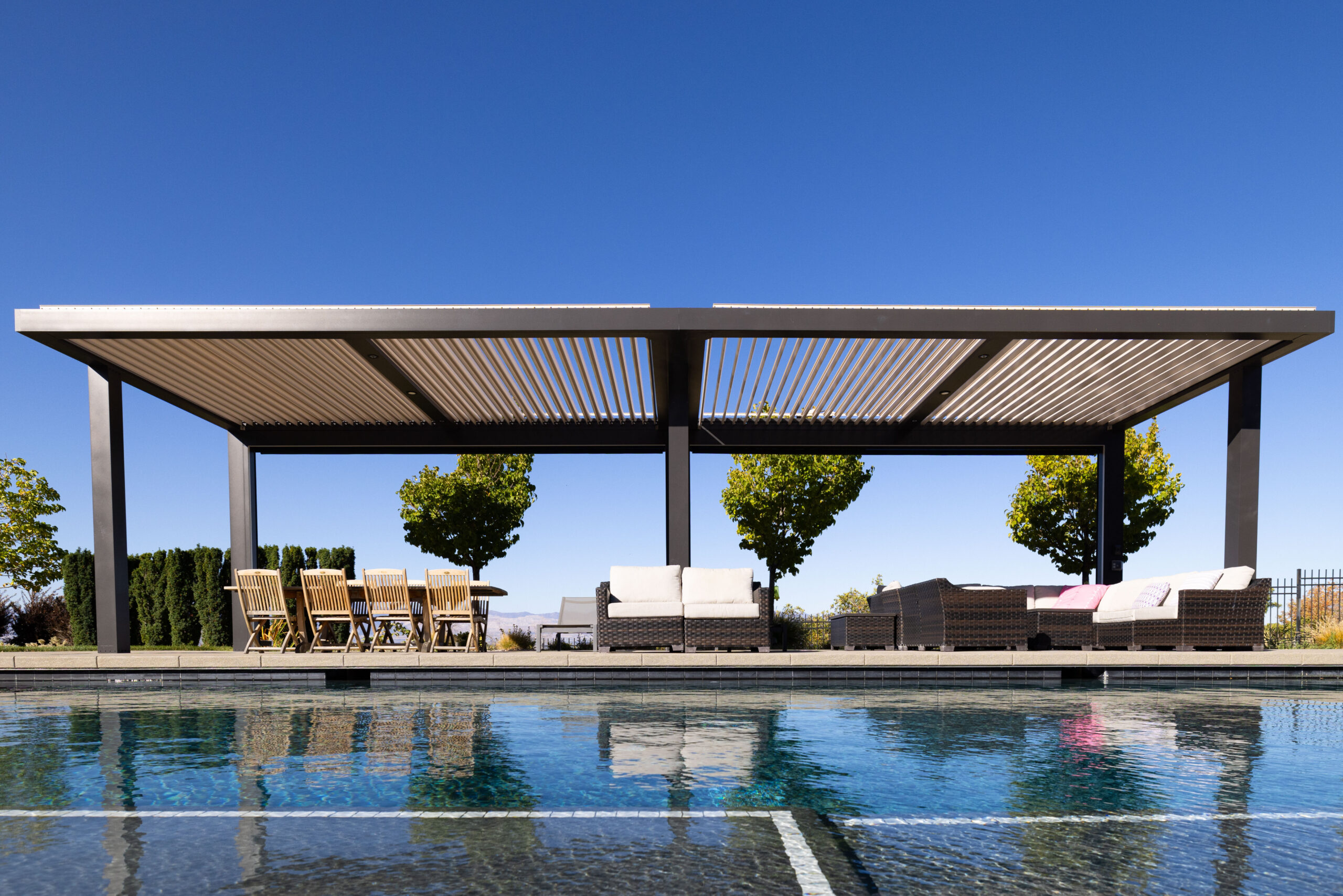 Pergola X near pool.