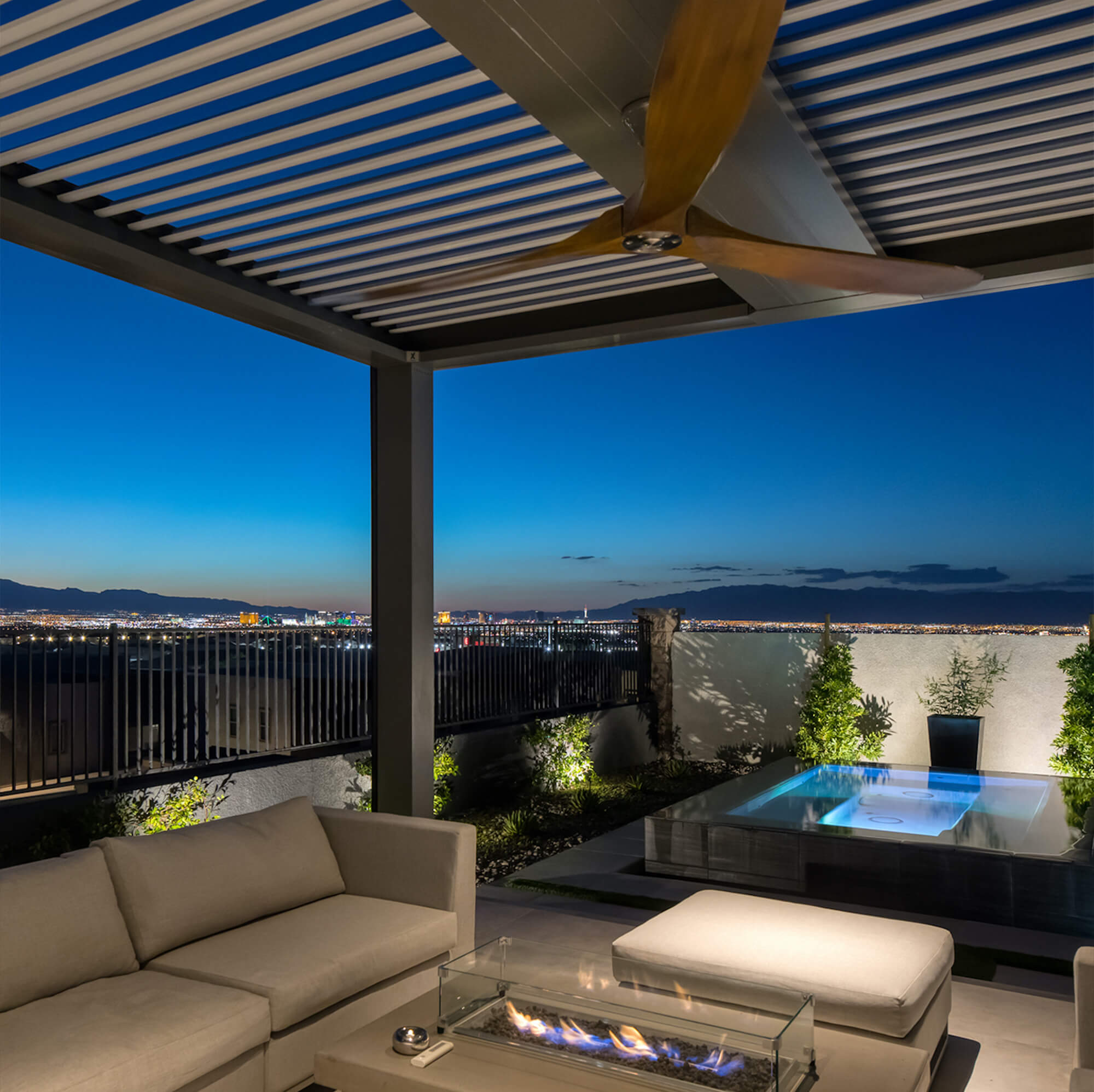 outdoor canopy with wood fan facing the view of the city