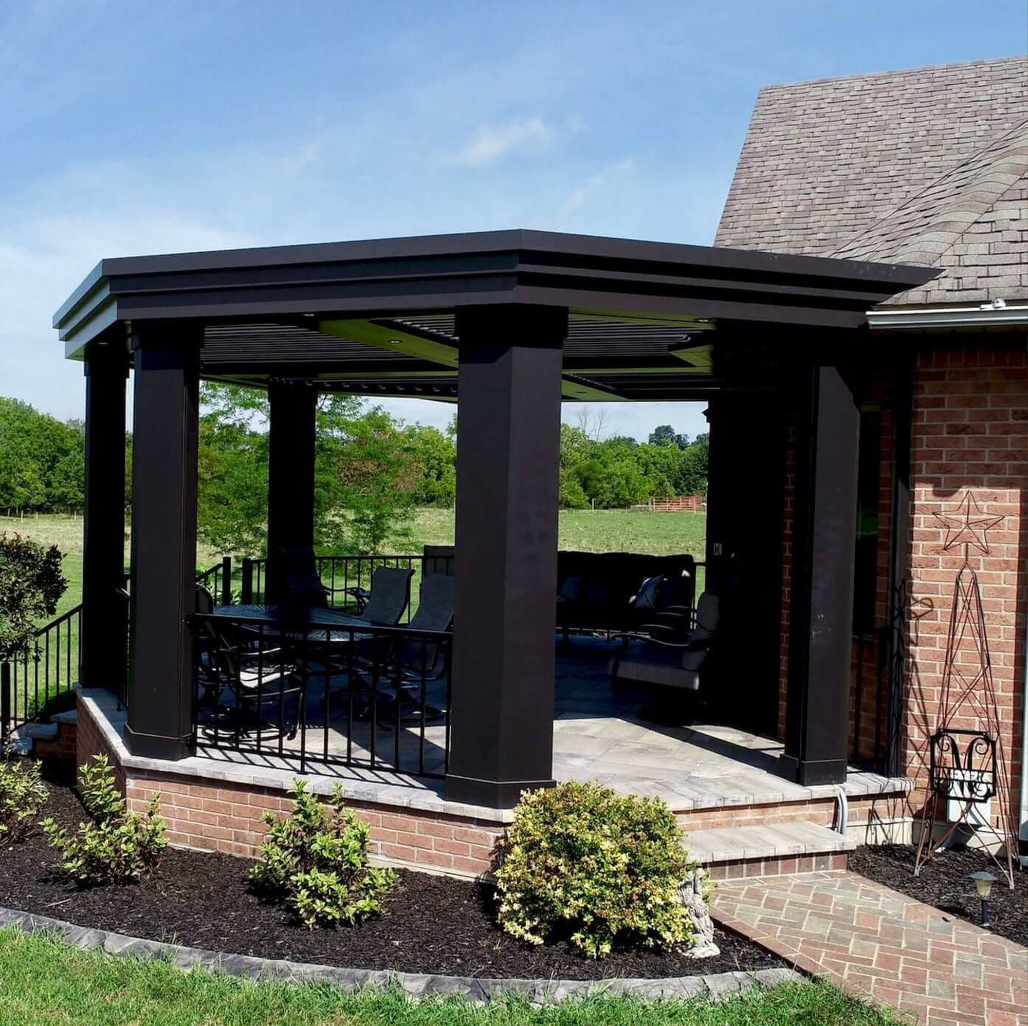 side view Bricks house with Bronze outdoor Pergola
