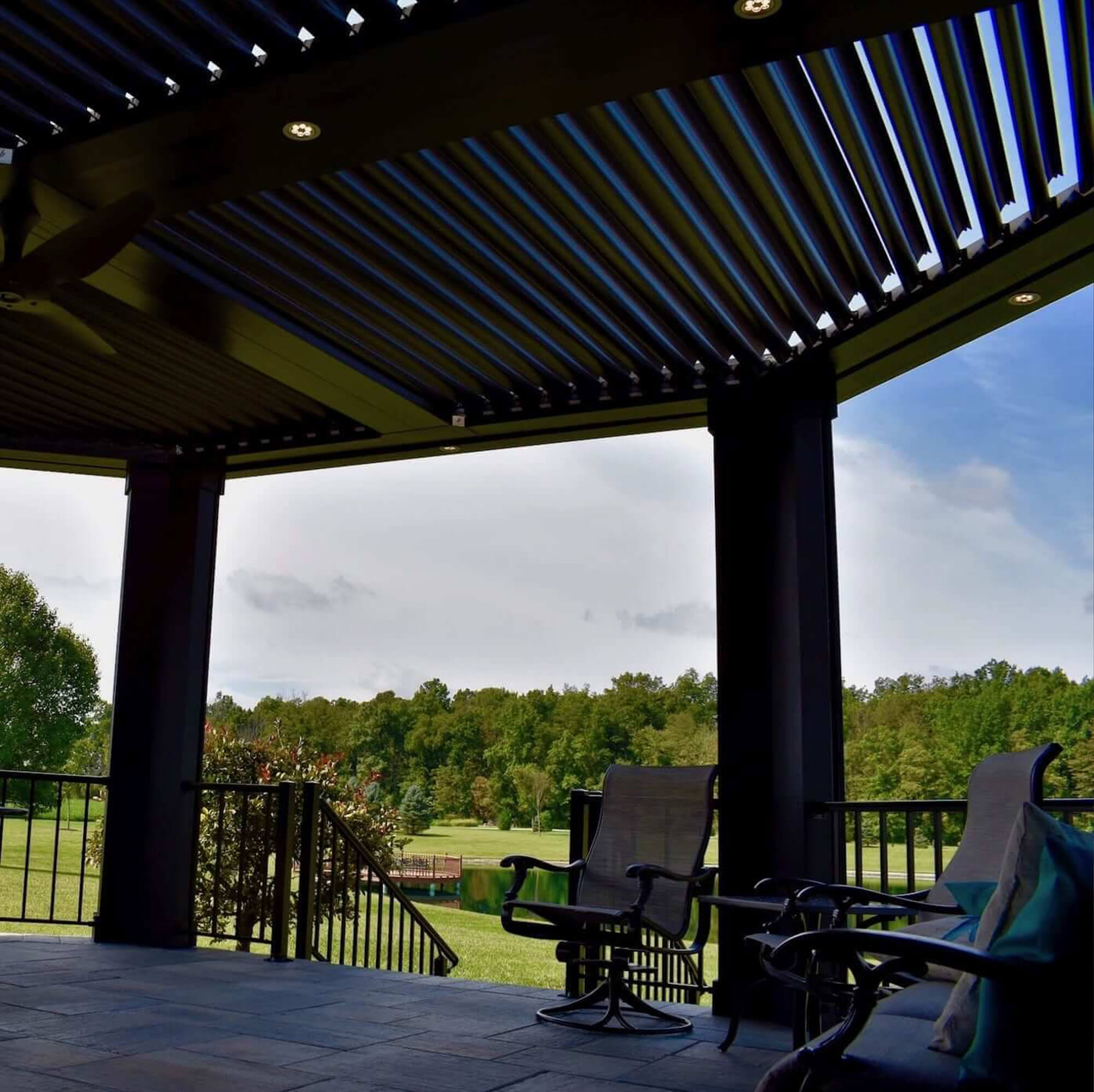other view facing right side outside house Bronze outdoor Pergola
