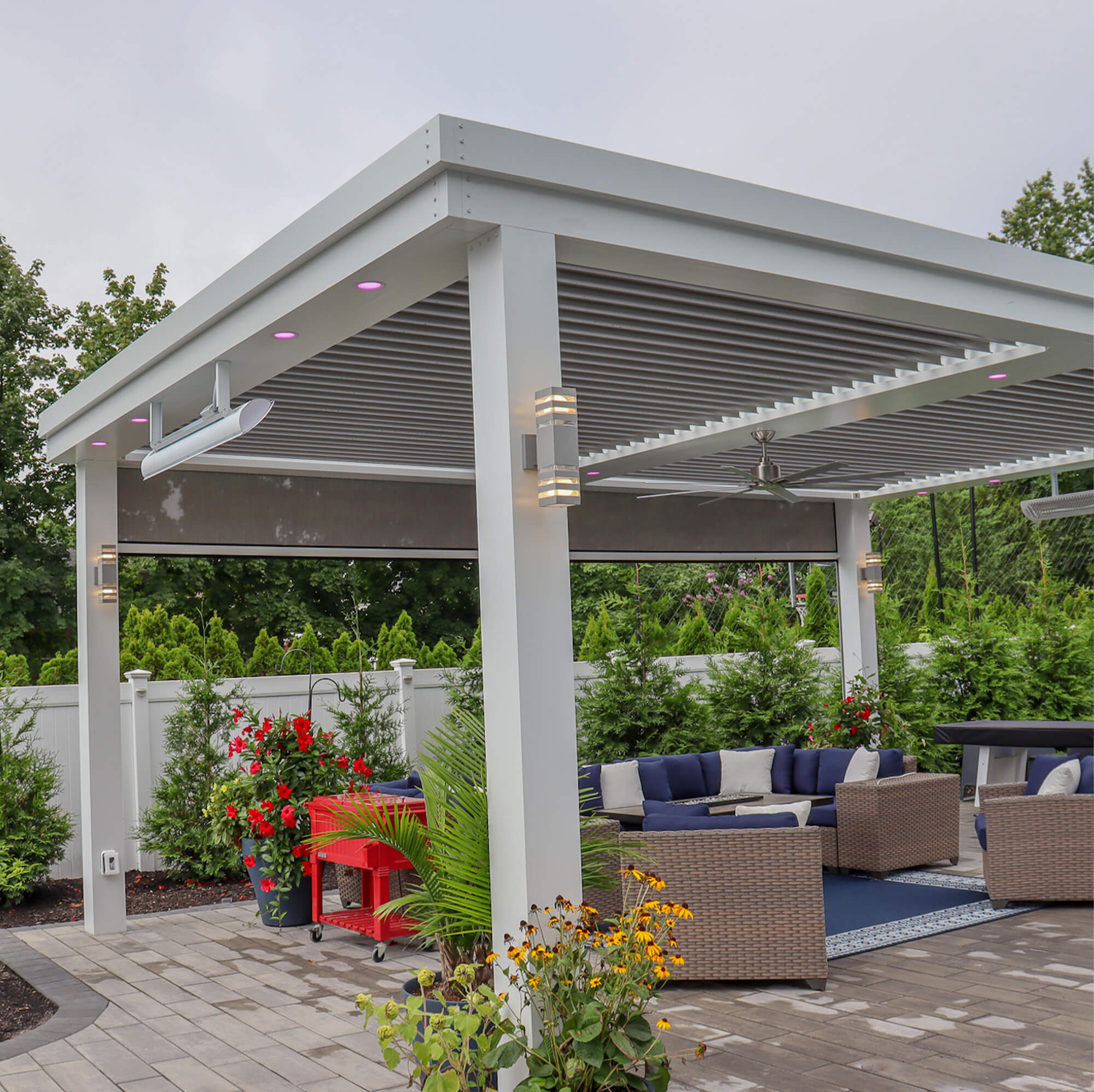 side view double outdoor canopy design with grey set sofa and white blue pillow