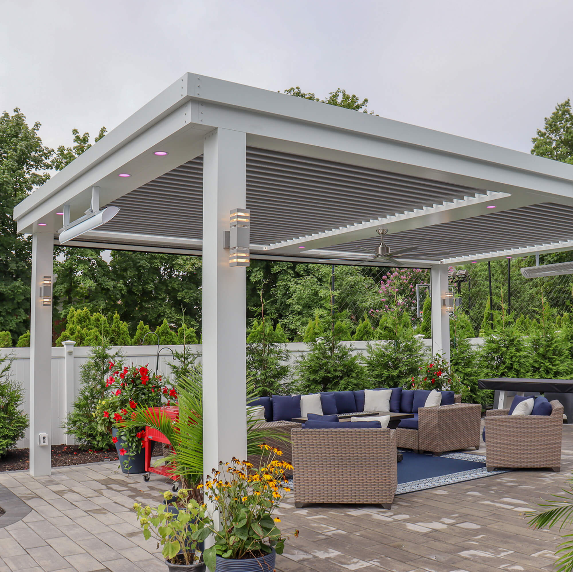 close view of double outdoor canopy design with grey set sofa and white blue pillow