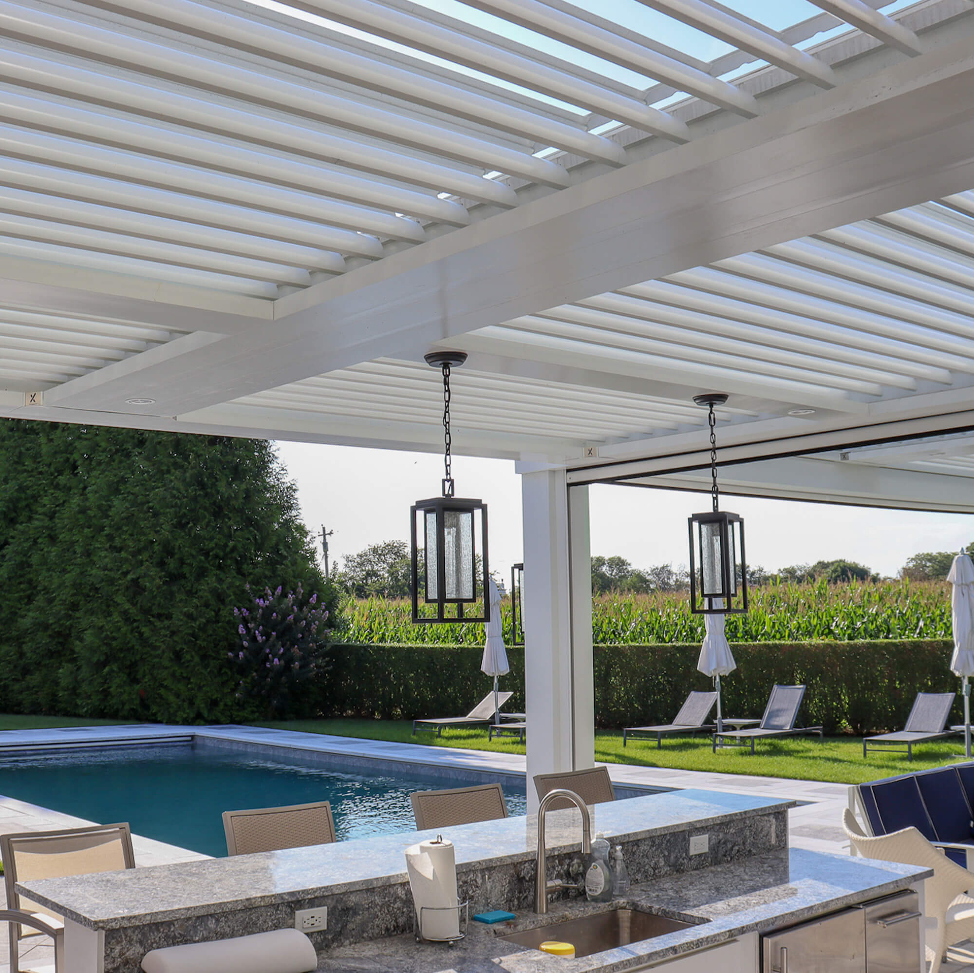 side view white outdoor canopy design with pillow and hanging lights