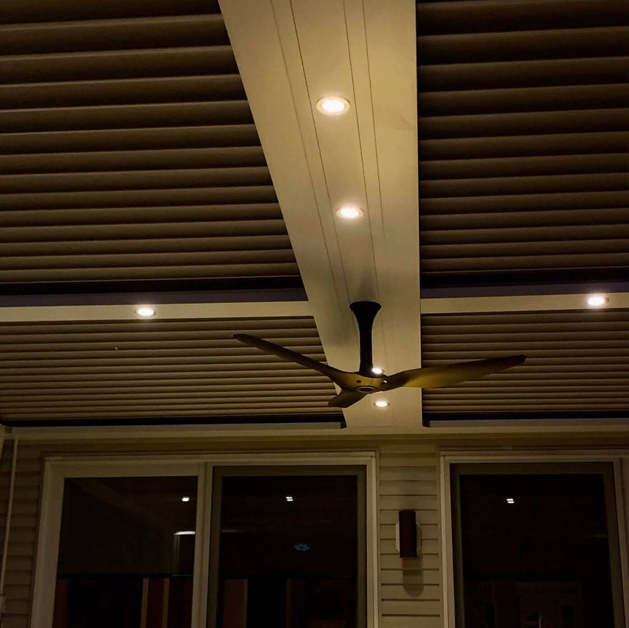 upper view of outdoor canopy design with fan and lights