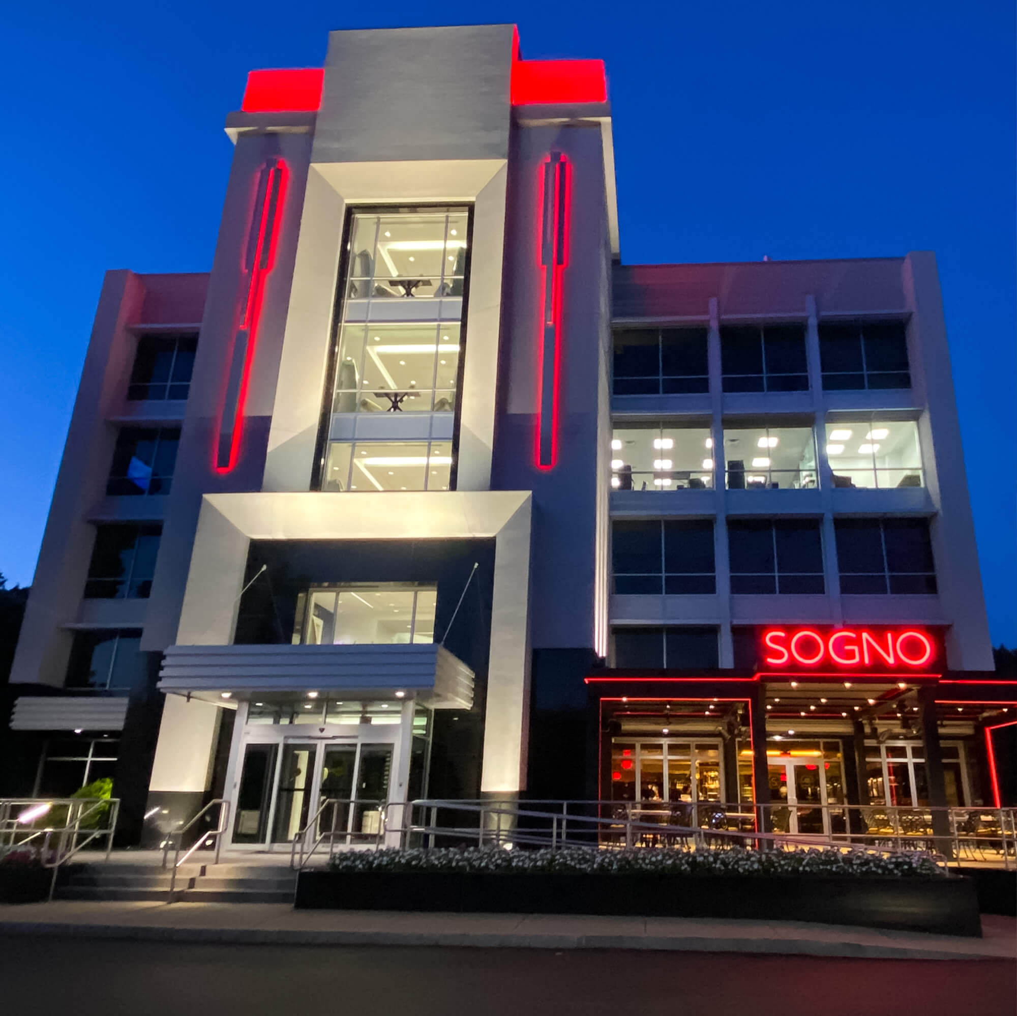 Sogno restaurant front view building with lights on