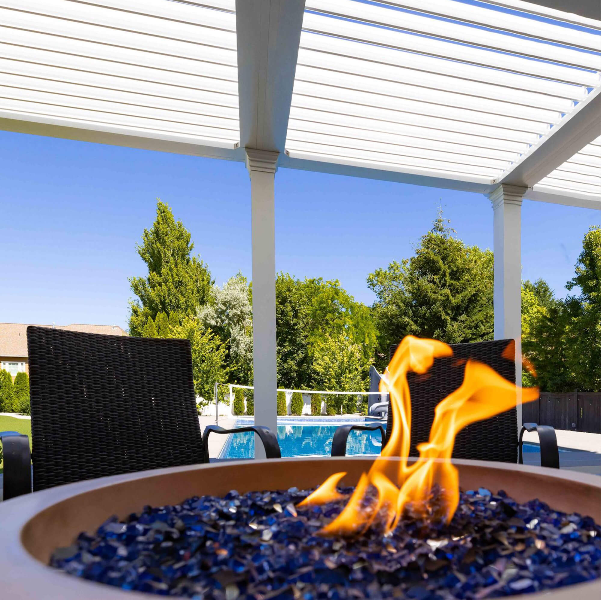 fire place image near the pool