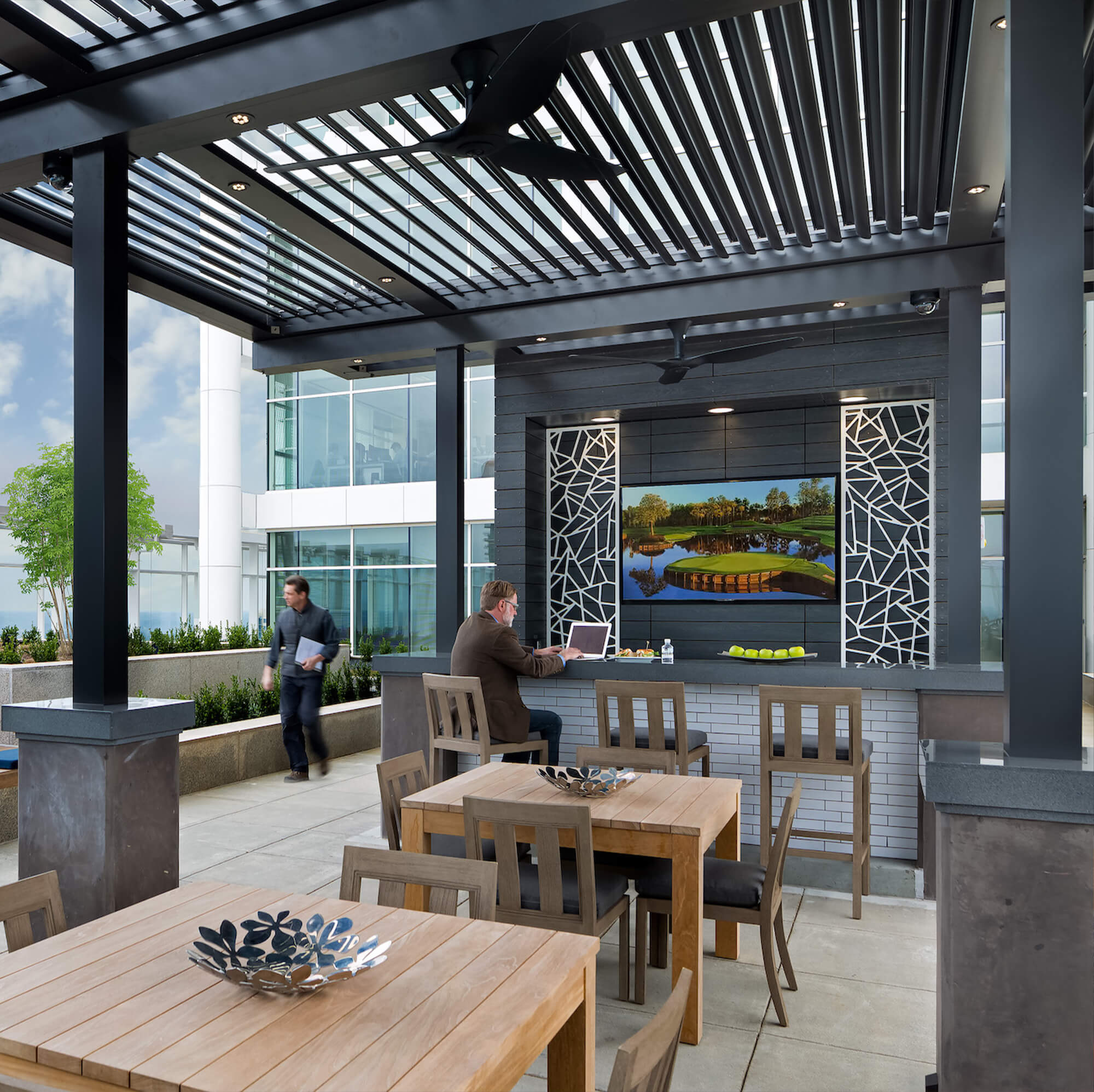 sky deck outdoor view black canopy and black kitchen