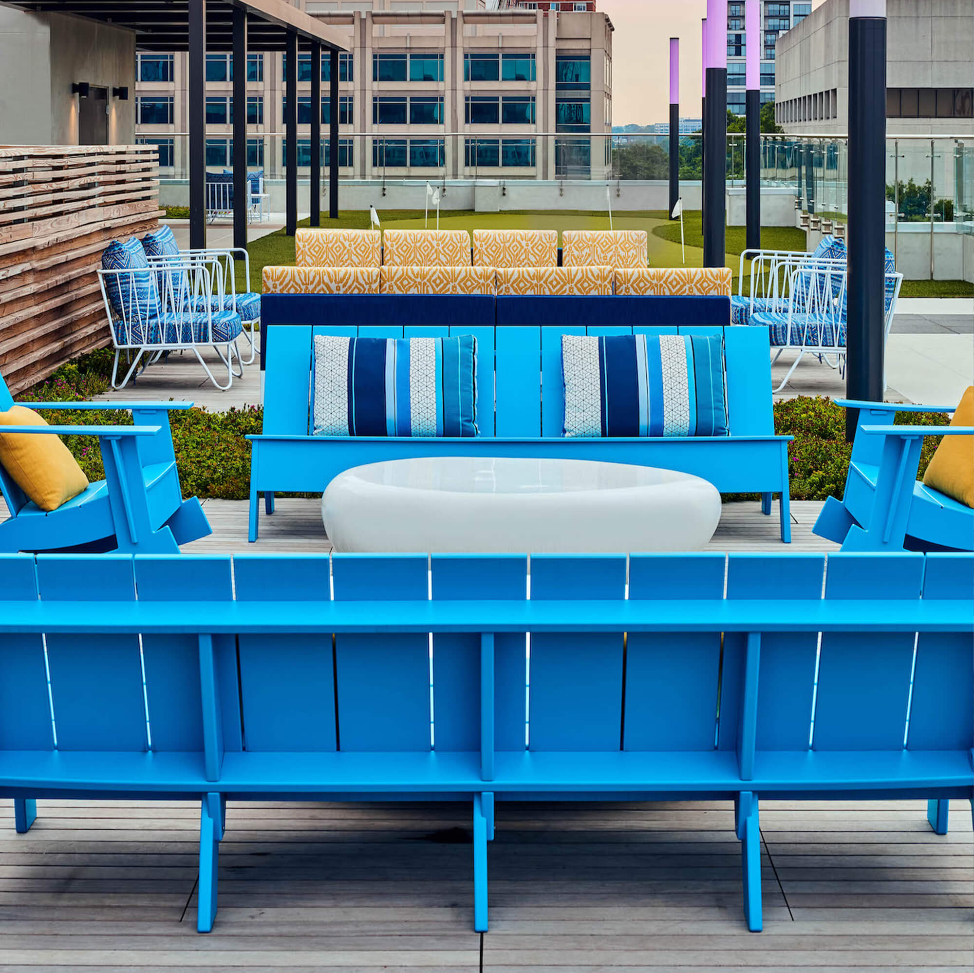 close up picture of blue chairs and white table set