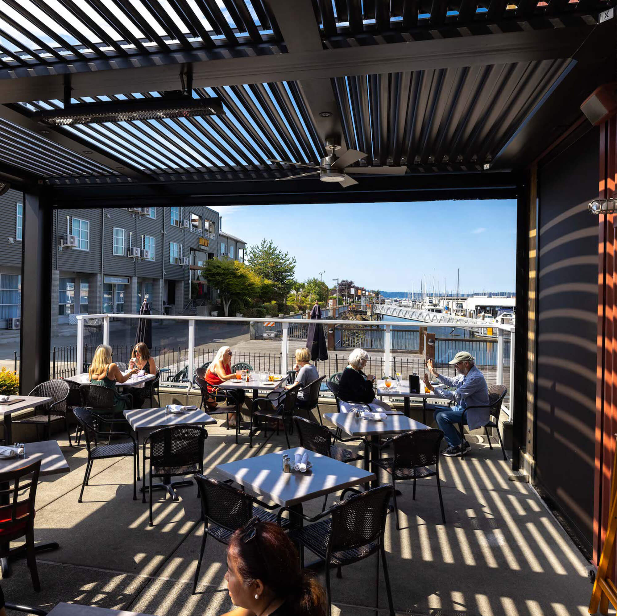 outdoor restaurant view with six customer facing sea view