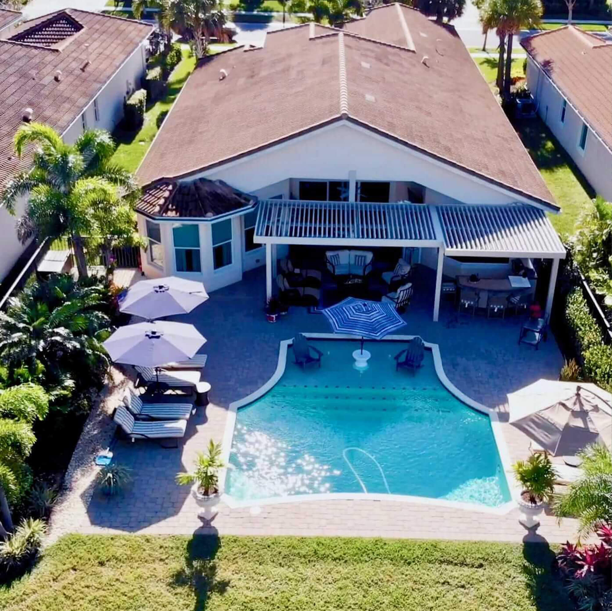 top view of big house with outdoor Pergola and pool