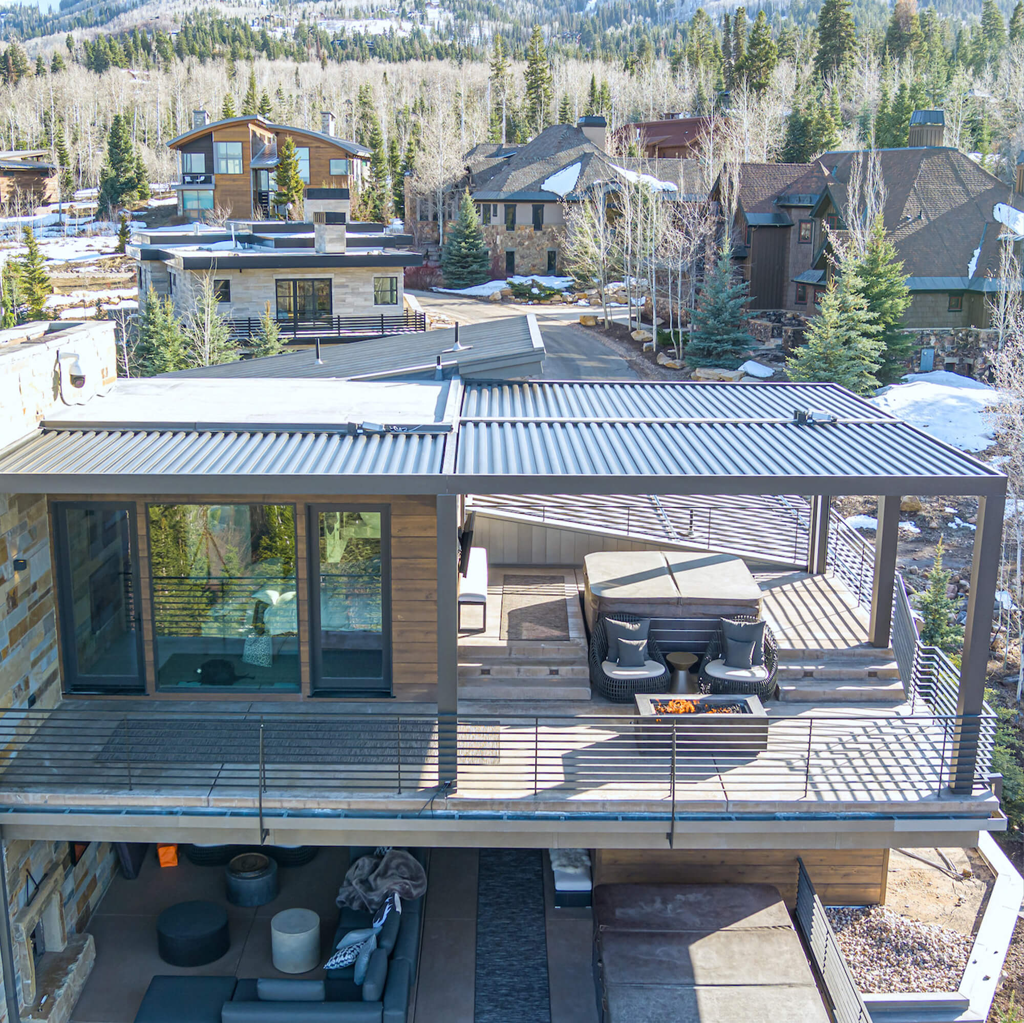 top closer view of a three storey house with outdoor Pergola