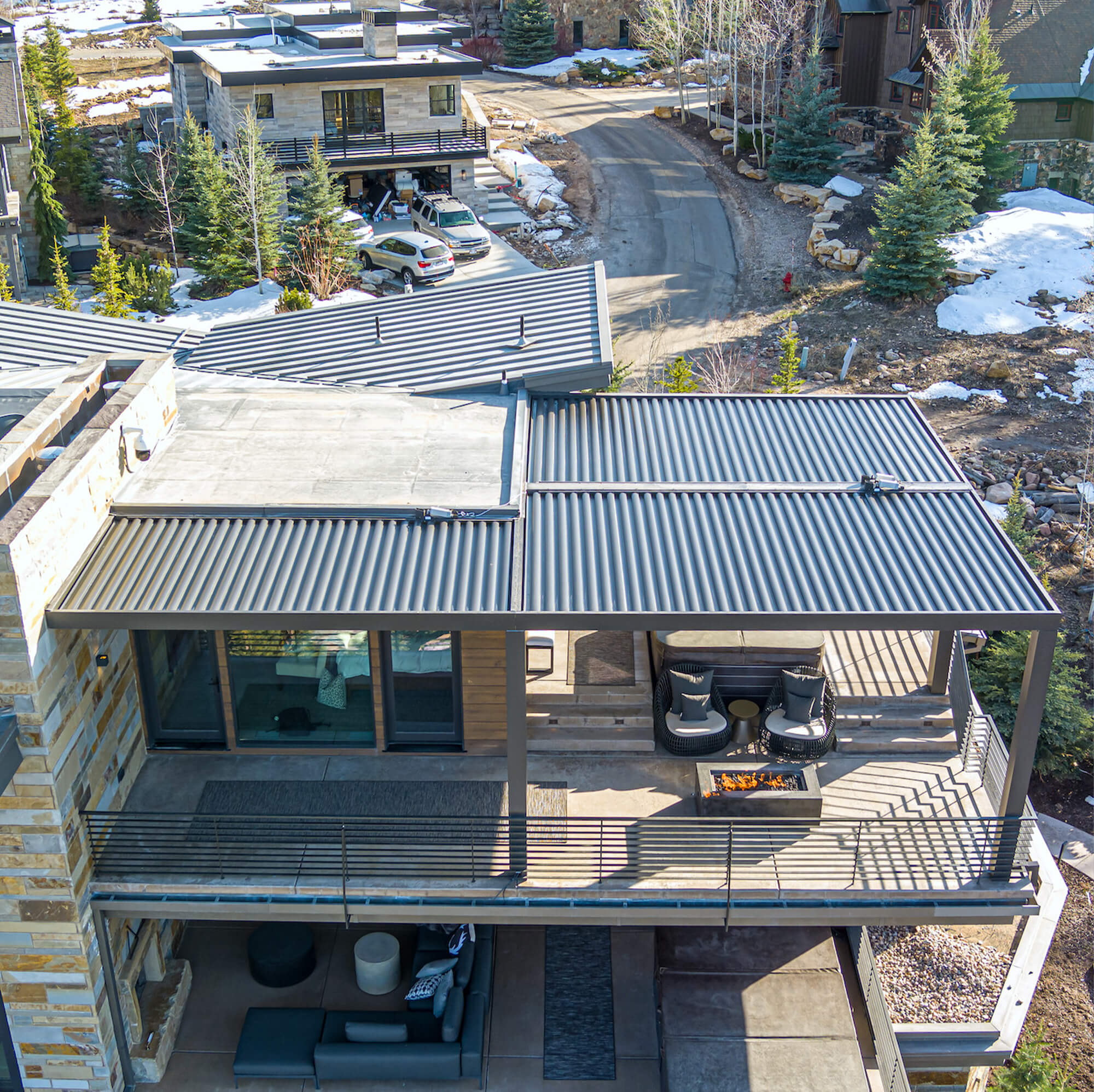 Top close up view of a three level house with outdoor Pergola installed