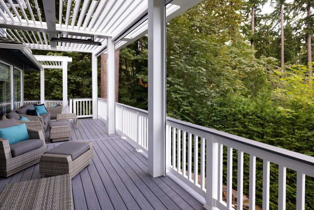 Pergola with Shade Overlooking Back Woods