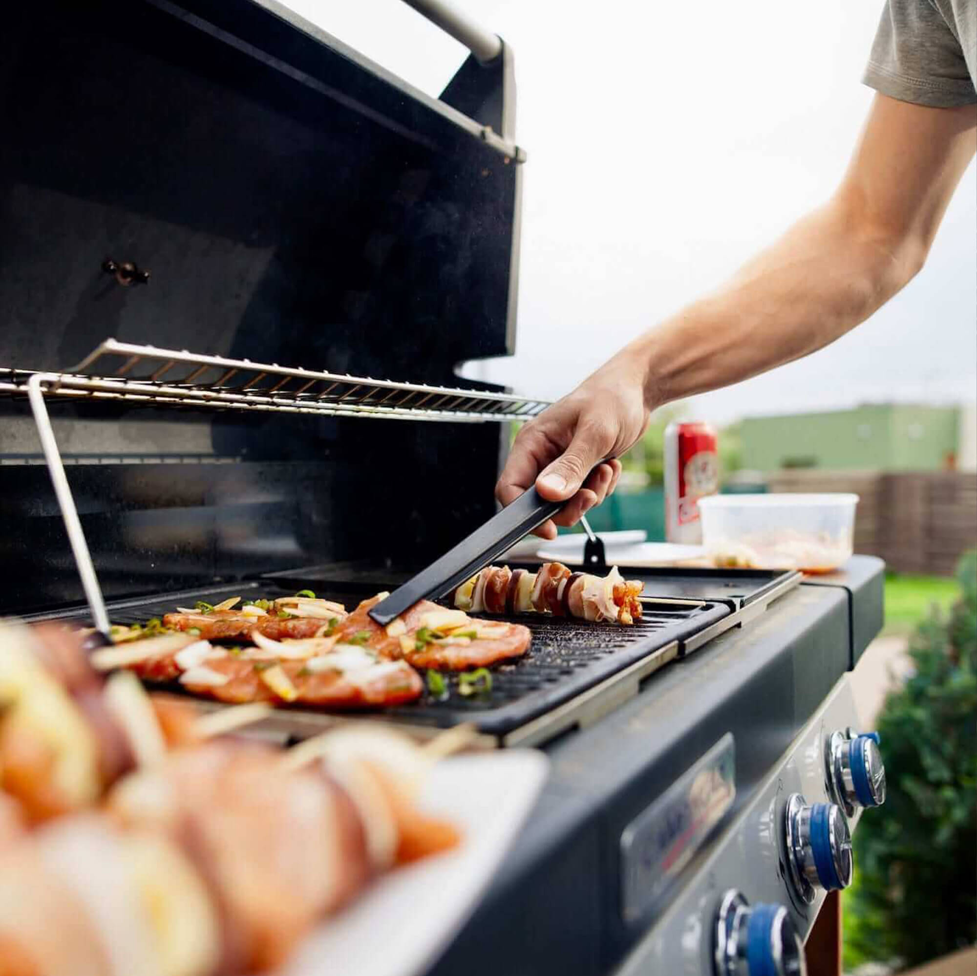 man grilling kebab and meat outdoor