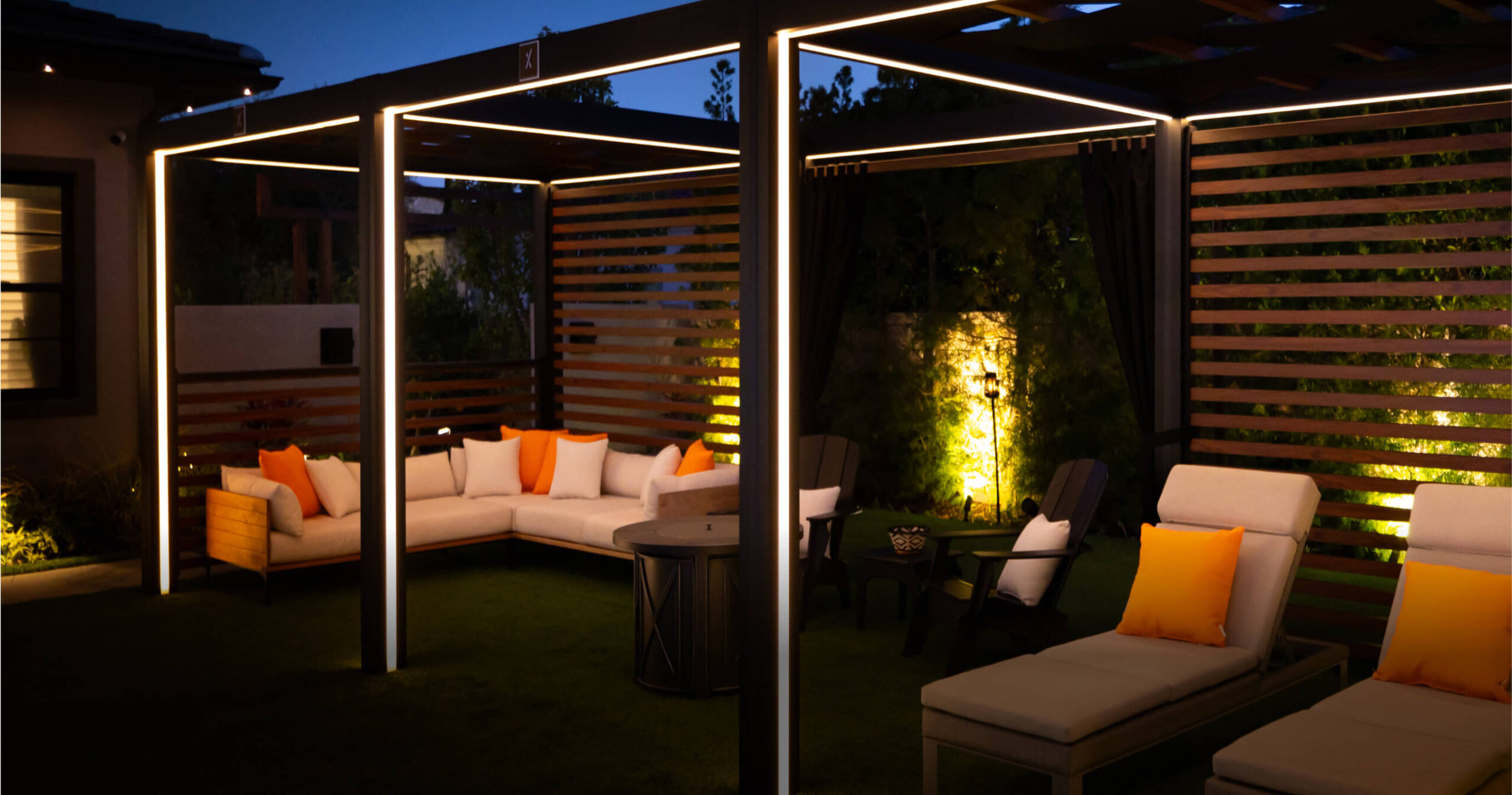 Night time view of a residential StruXure pergola