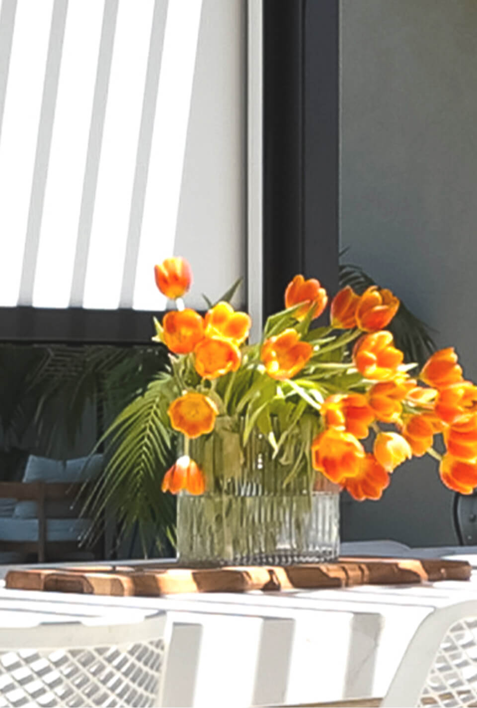 Detail image of a table setting with flowers outside