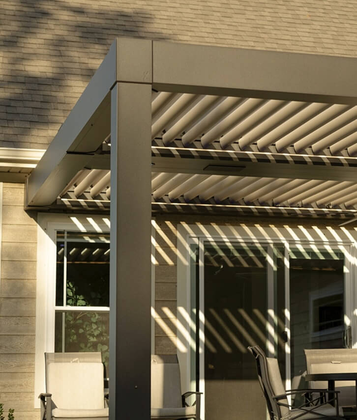 Bronze Evolve with light shining through louvers