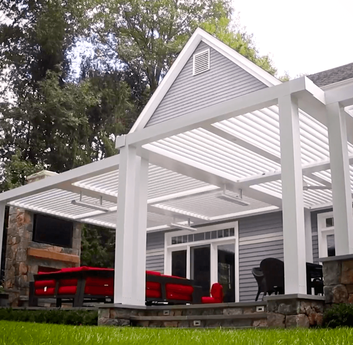Wide shot of house with backyard custom white Pergola X system