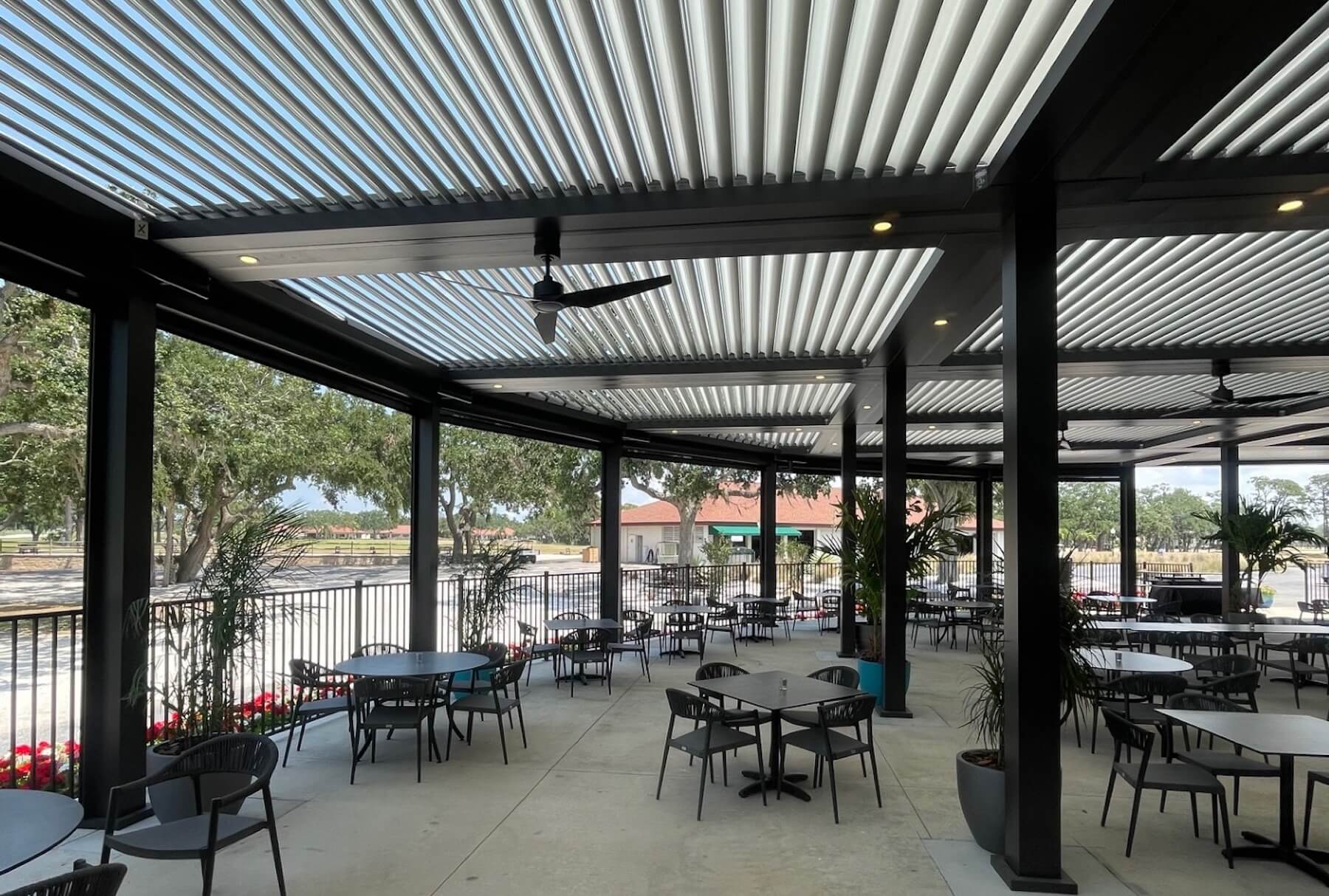 Palm Aire Country club outdoor dinning under a Pergola X