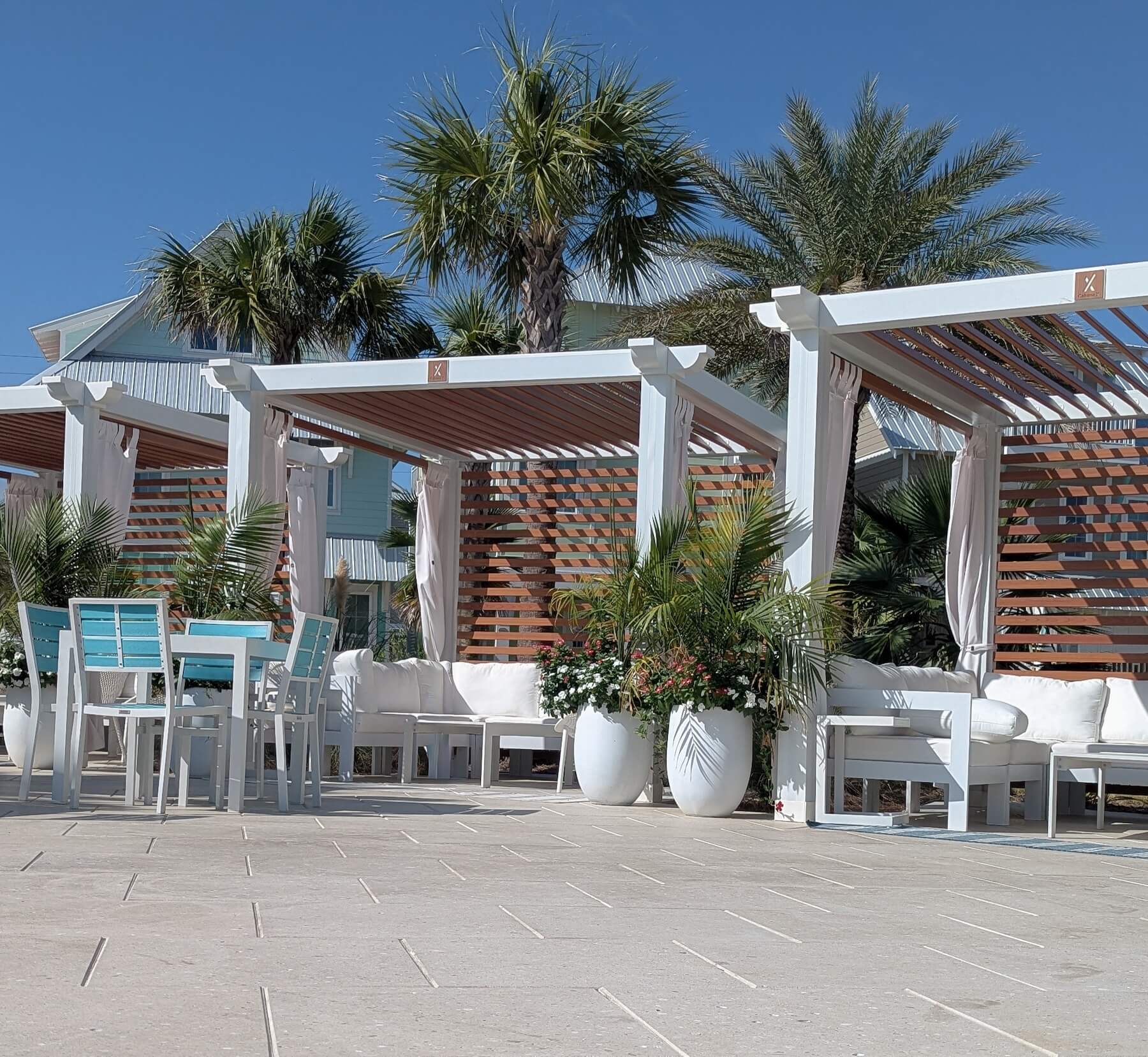 Multiple Cabana X next to each other by the pool area