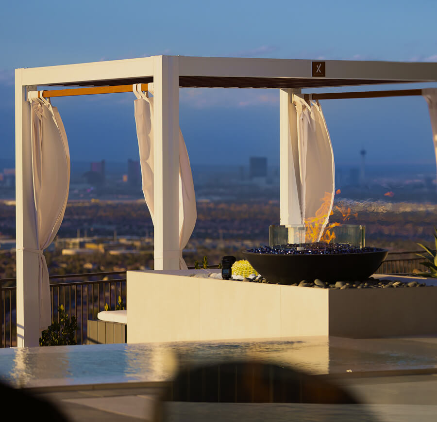 White Cabana X with curtains overlooking city view
