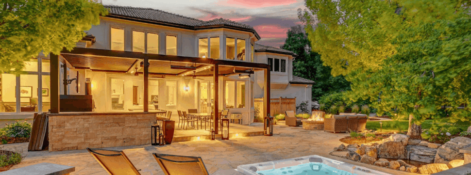 Custom pergola sized for an outdoor living space with hot tub, patio seating, and shade coverage
