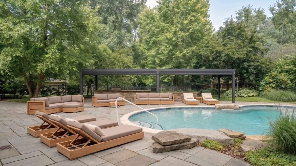 Attached StruXure Pergola X spanning a furnished patio beside a residential pool